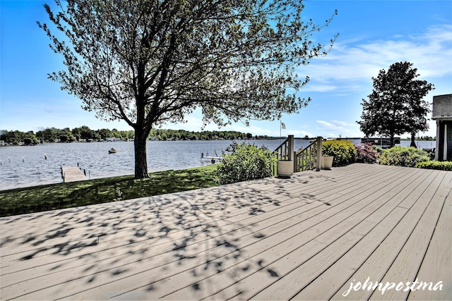1875 Edwin Dr, Wayland, MI 49348 - wooden deck featuring a water view and a boat dock