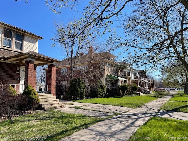 view of home's exterior featuring a lawn