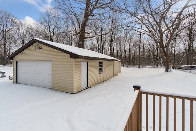 view of snow covered garage