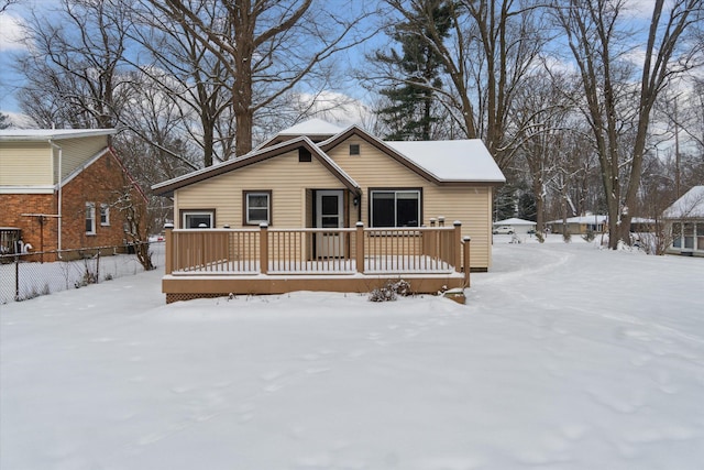 view of front of property featuring a wooden deck