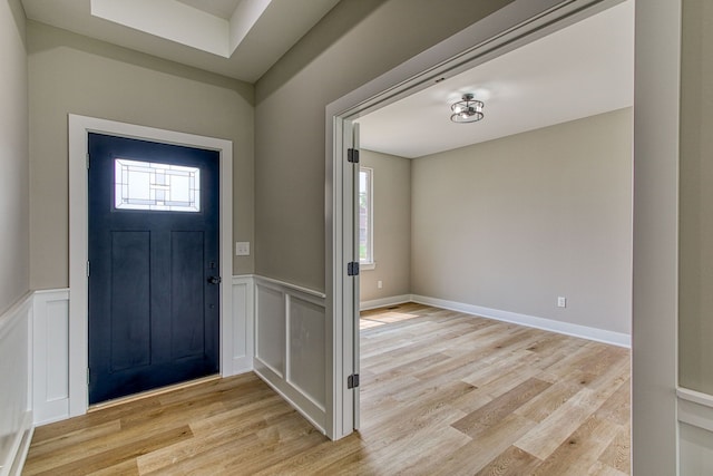 foyer entrance with light hardwood / wood-style flooring