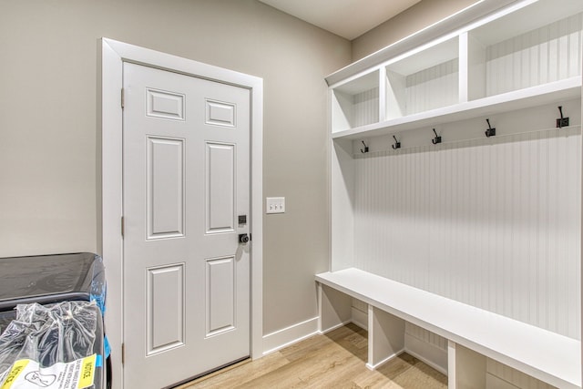 mudroom with light hardwood / wood-style flooring