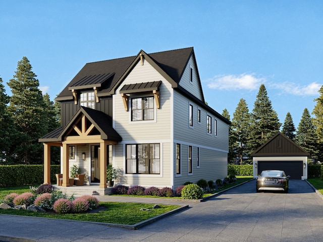 modern farmhouse with a garage and an outbuilding