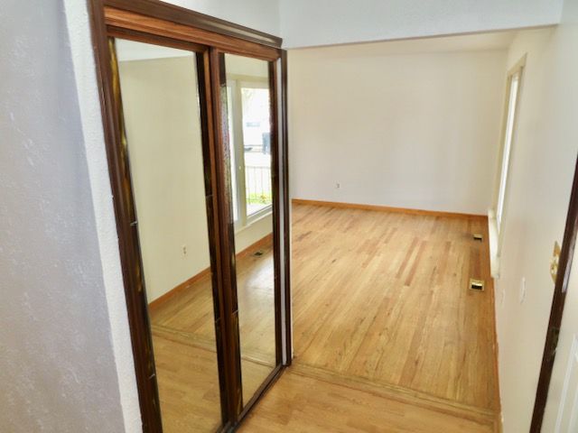 hallway featuring light hardwood / wood-style flooring