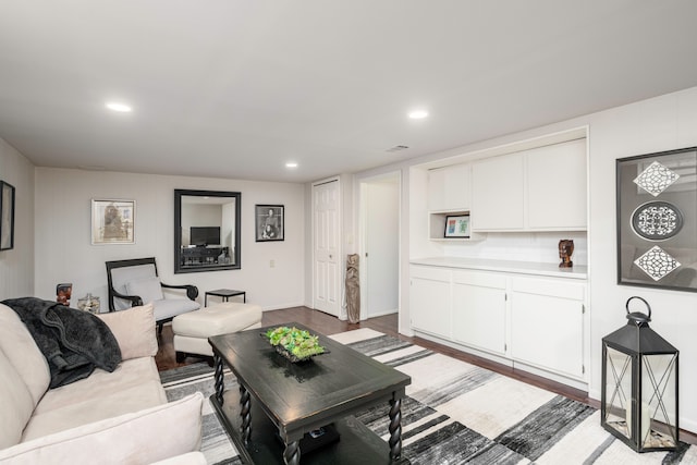 2100 Hyde Park Rd, Detroit, MI 48207 - living room with wood finished floors, recessed lighting, and baseboards