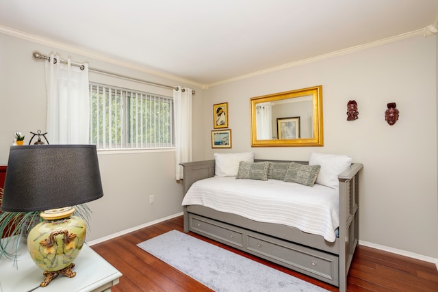 2100 Hyde Park Rd, Detroit, MI 48207 - bedroom with crown molding, wood finished floors, and baseboards