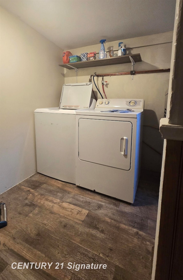 washroom with independent washer and dryer and dark hardwood / wood-style floors