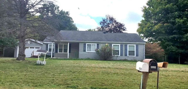 ranch-style house with a front yard and a garage