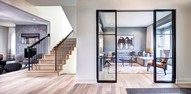 827 Larchlea Dr, Birmingham, MI 48009 - stairs featuring wood finished floors, baseboards, and recessed lighting
