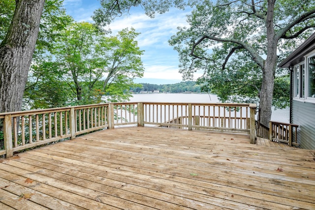 wooden terrace with a water view