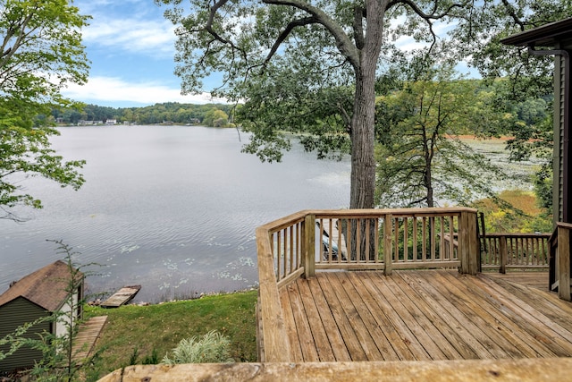 wooden terrace with a water view