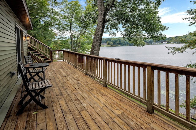 deck featuring a water view