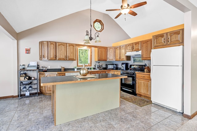 kitchen with ceiling fan with notable chandelier, black appliances, high vaulted ceiling, a kitchen island, and hanging light fixtures