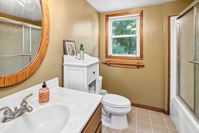 full bathroom featuring vanity, enclosed tub / shower combo, tile patterned flooring, toilet, and lofted ceiling