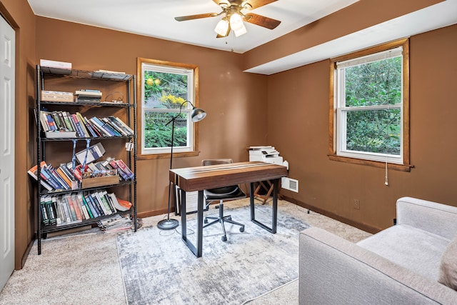 office with ceiling fan, light carpet, and a wealth of natural light