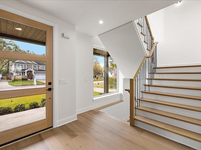 entryway with light hardwood / wood-style flooring