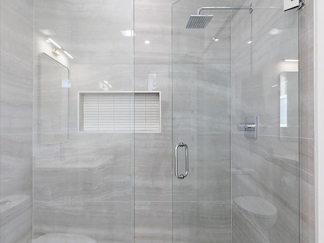 bathroom with an enclosed shower