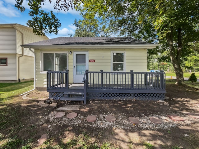 view of front facade featuring a wooden deck