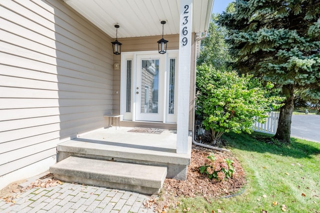 doorway to property with covered porch