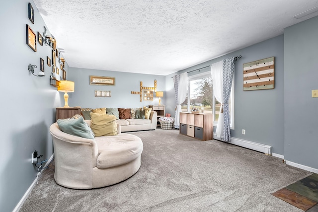 living room featuring carpet flooring, a textured ceiling, and a baseboard heating unit