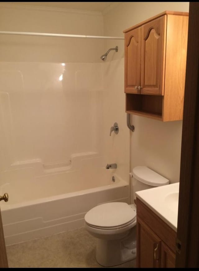 full bathroom with vanity, shower / bath combination, and toilet