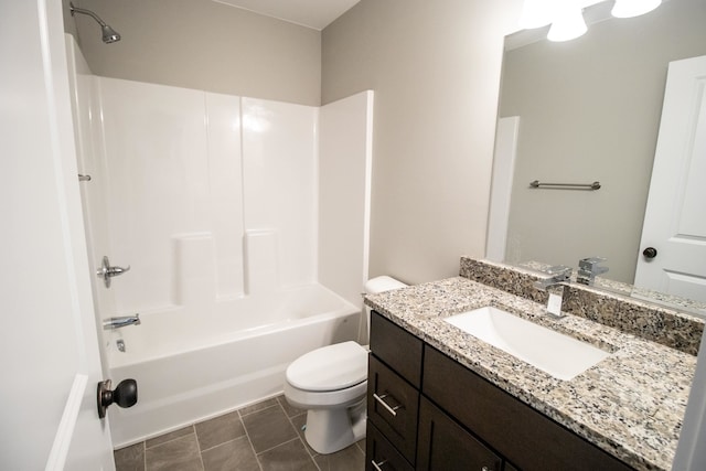 full bathroom with bathtub / shower combination, tile patterned floors, vanity, and toilet