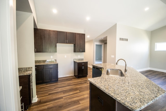 kitchen with black dishwasher, an island with sink, dark hardwood / wood-style floors, and sink