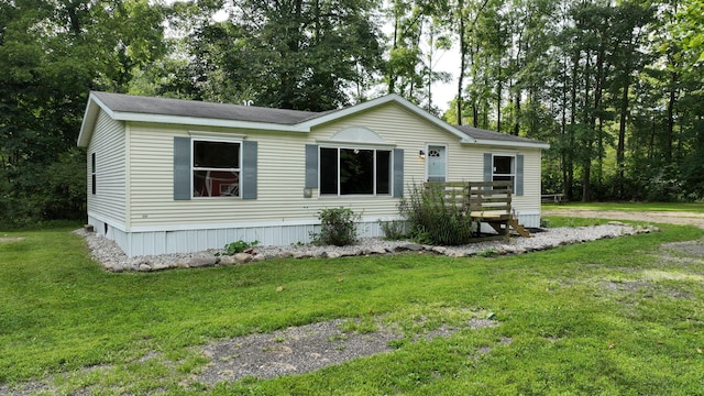 exterior space featuring a front yard