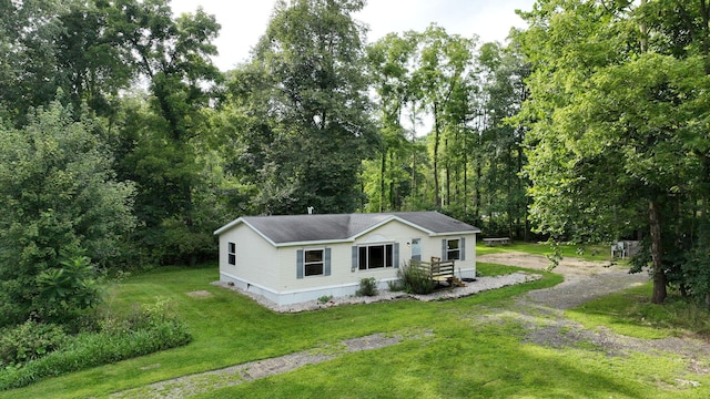 view of front of home with a front lawn