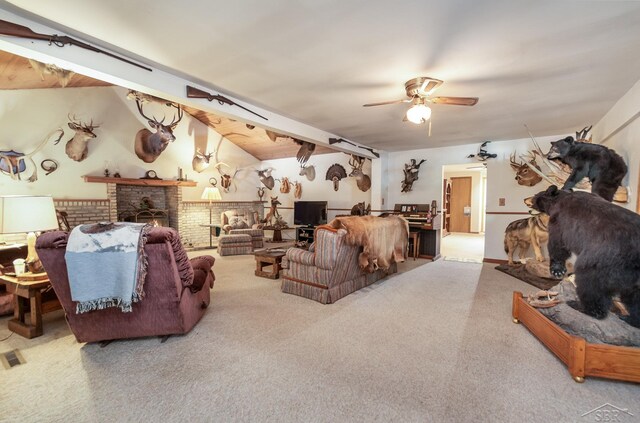 6610 E Arnold Lake Rd, Harrison, MI 48625 - living area with a ceiling fan, carpet, lofted ceiling, and a fireplace