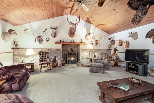 6610 E Arnold Lake Rd, Harrison, MI 48625 - carpeted living room with vaulted ceiling, wooden ceiling, a fireplace, and a ceiling fan