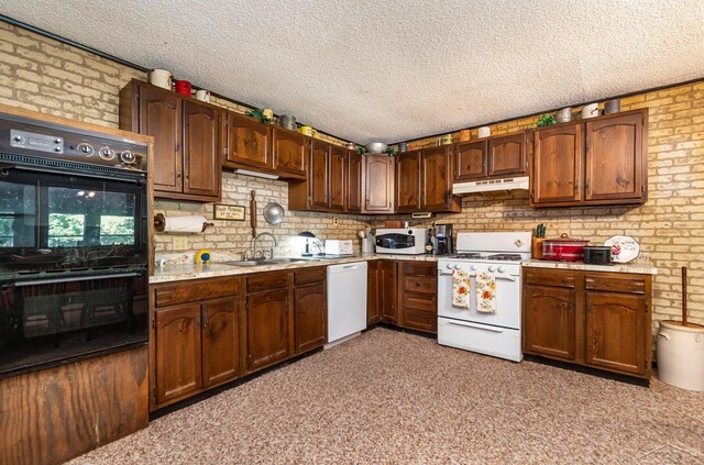 6610 E Arnold Lake Rd, Harrison, MI 48625 - kitchen with white appliances, under cabinet range hood, a sink, light countertops, and a textured ceiling