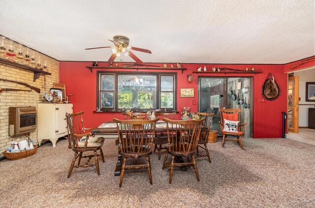 6610 E Arnold Lake Rd, Harrison, MI 48625 - dining area featuring carpet floors, a textured ceiling, heating unit, and a ceiling fan