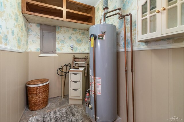 6610 E Arnold Lake Rd, Harrison, MI 48625 - utility room with gas water heater and electric panel