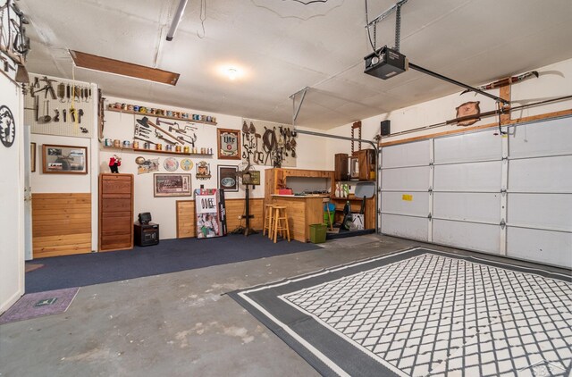 6610 E Arnold Lake Rd, Harrison, MI 48625 - garage with a garage door opener