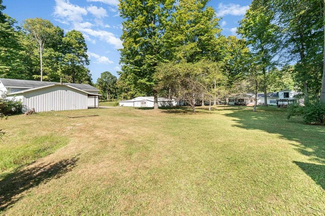 6610 E Arnold Lake Rd, Harrison, MI 48625 - view of grassy yard