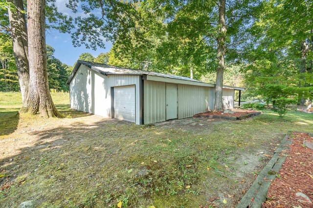 6610 E Arnold Lake Rd, Harrison, MI 48625 - view of detached garage
