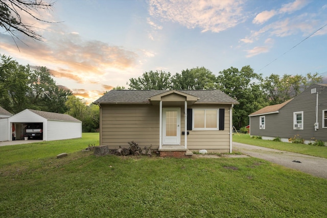 bungalow-style home featuring a yard