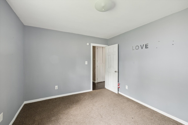 empty room featuring carpet flooring