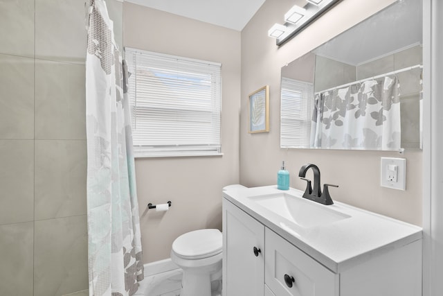 18272 Ohio St, Detroit, MI 48221 - bathroom with marble look tiles, vanity, toilet, baseboards, and curtained shower