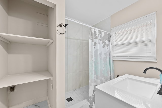 18272 Ohio St, Detroit, MI 48221 - bathroom featuring marble look tile flooring, a tile shower, and vanity