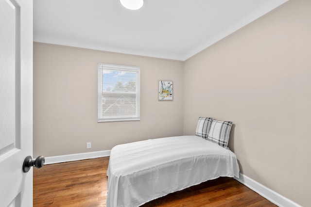 bedroom featuring hardwood / wood-style floors