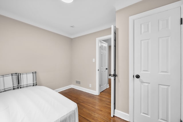 bedroom featuring hardwood / wood-style flooring