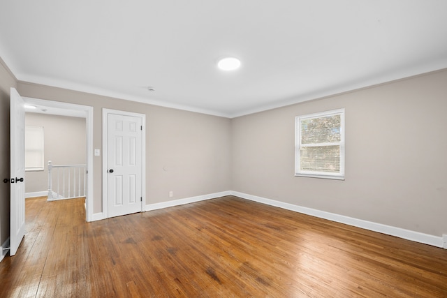 unfurnished room featuring wood-type flooring