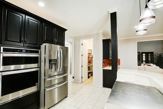 kitchen with pendant lighting, light tile patterned flooring, crown molding, and stainless steel appliances