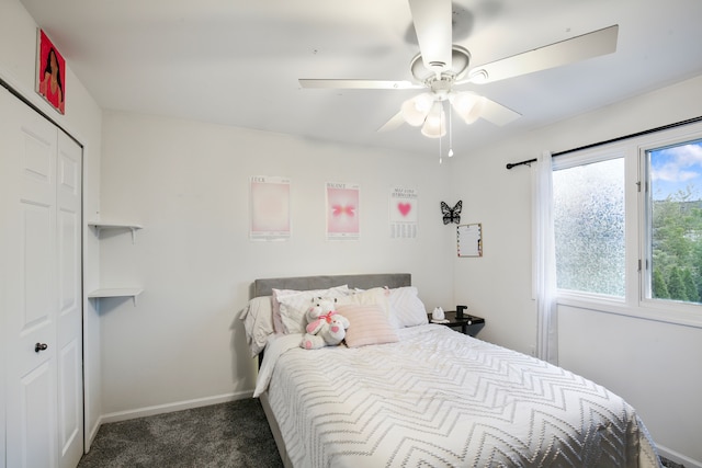 carpeted bedroom featuring a closet and ceiling fan