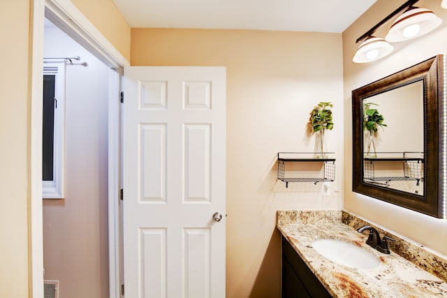 bathroom featuring vanity