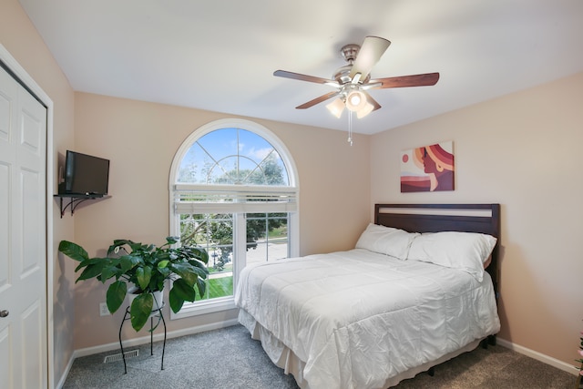 bedroom featuring ceiling fan and carpet floors