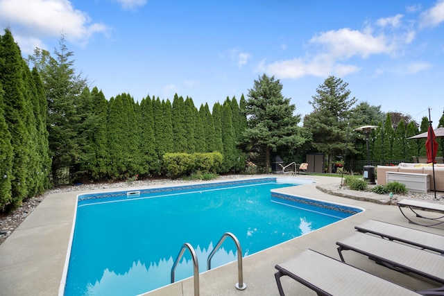 view of pool with a patio