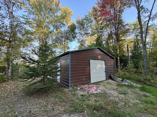 view of outbuilding with a garage